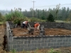 11 A local stone mason was hired to lay the foundation of Ms. Reba's new house.